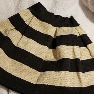 Black and gold skirt.